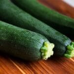 zucchini on a wooden surface