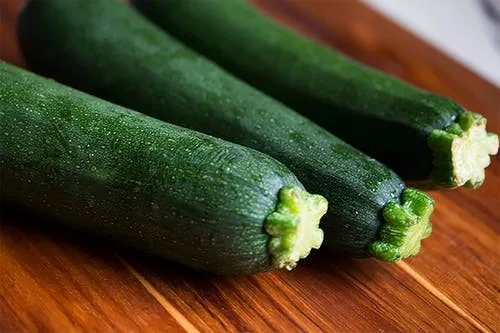 zucchini on a wooden surface