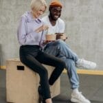 two people eating cilantro lime salmon bowls