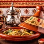 Moroccan chicken tagine served in a traditional Moroccan vessel called a tagine